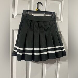 Black and white pleated mini skirt